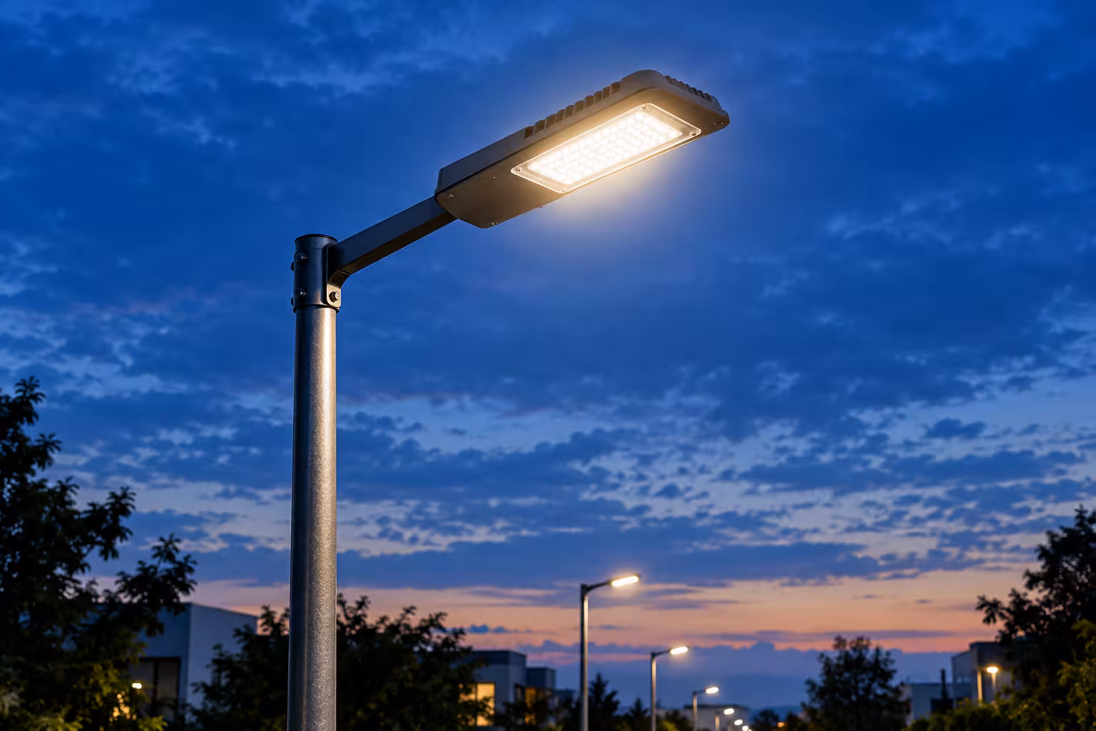 Street light fixture installation and pole maintenance at twilight